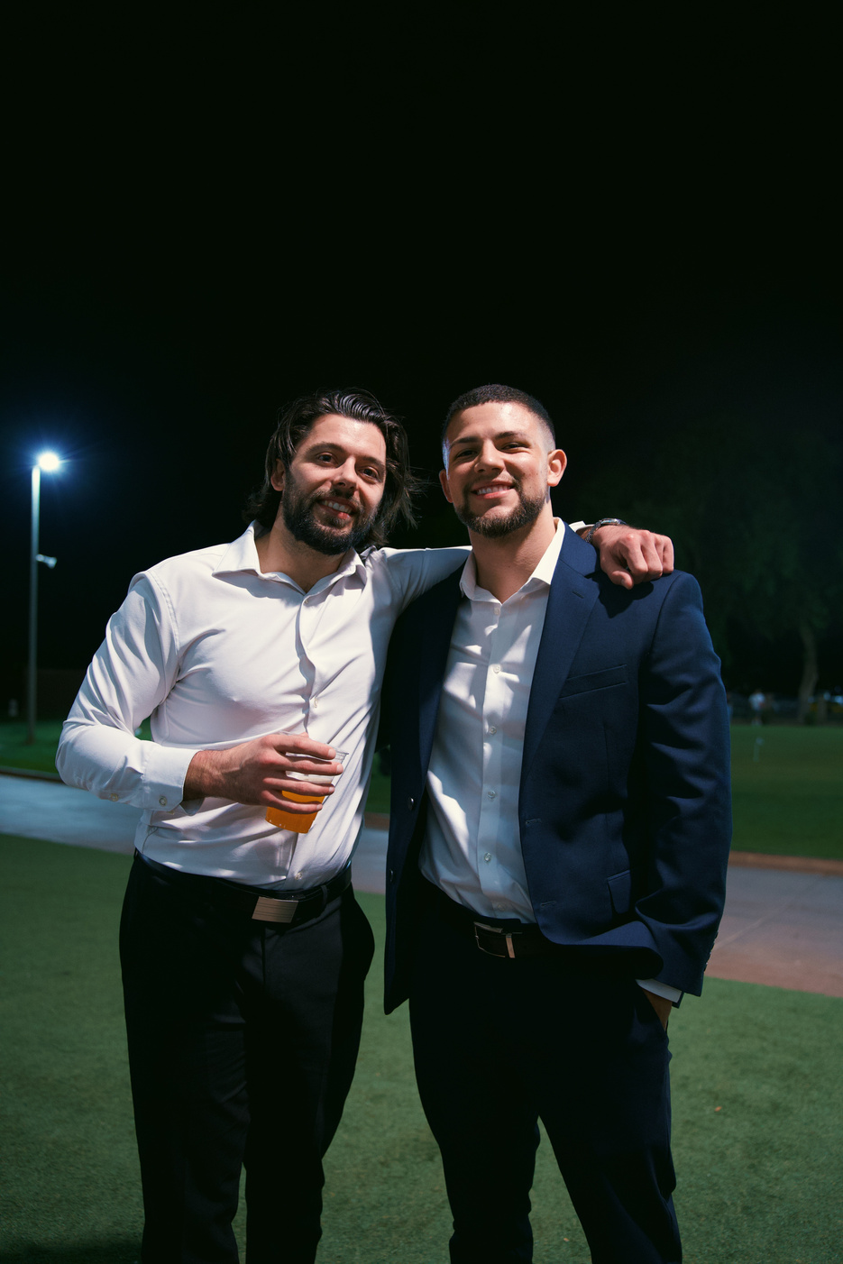 Two guests at an evening social hub